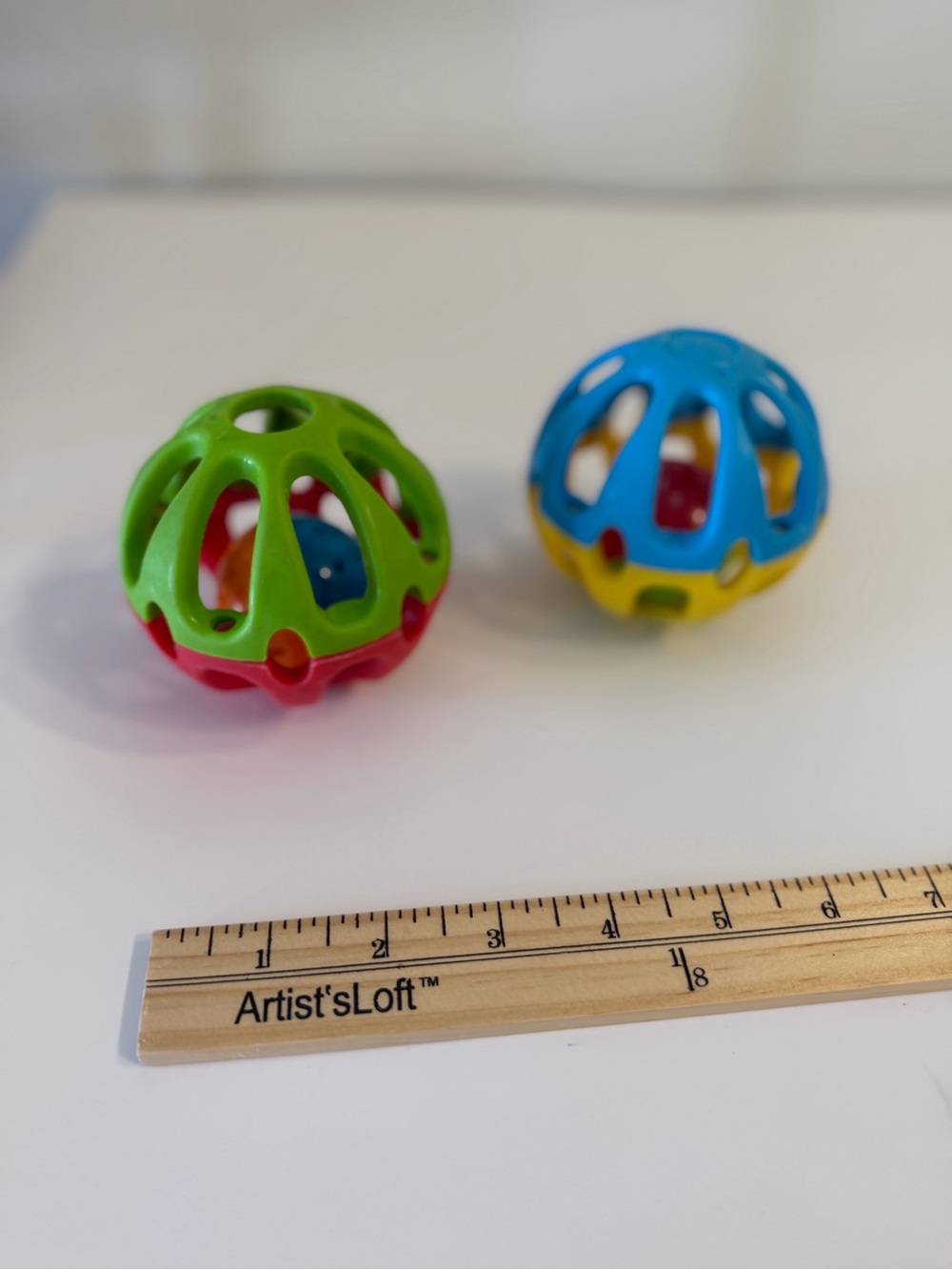 Colorful Baby Rattle Balls Pack - Green & Blue. Bounced and roll. Grab and hold